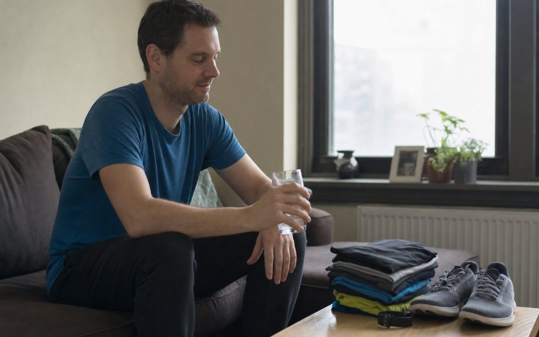 An everyday runner relaxing at home the day before a race